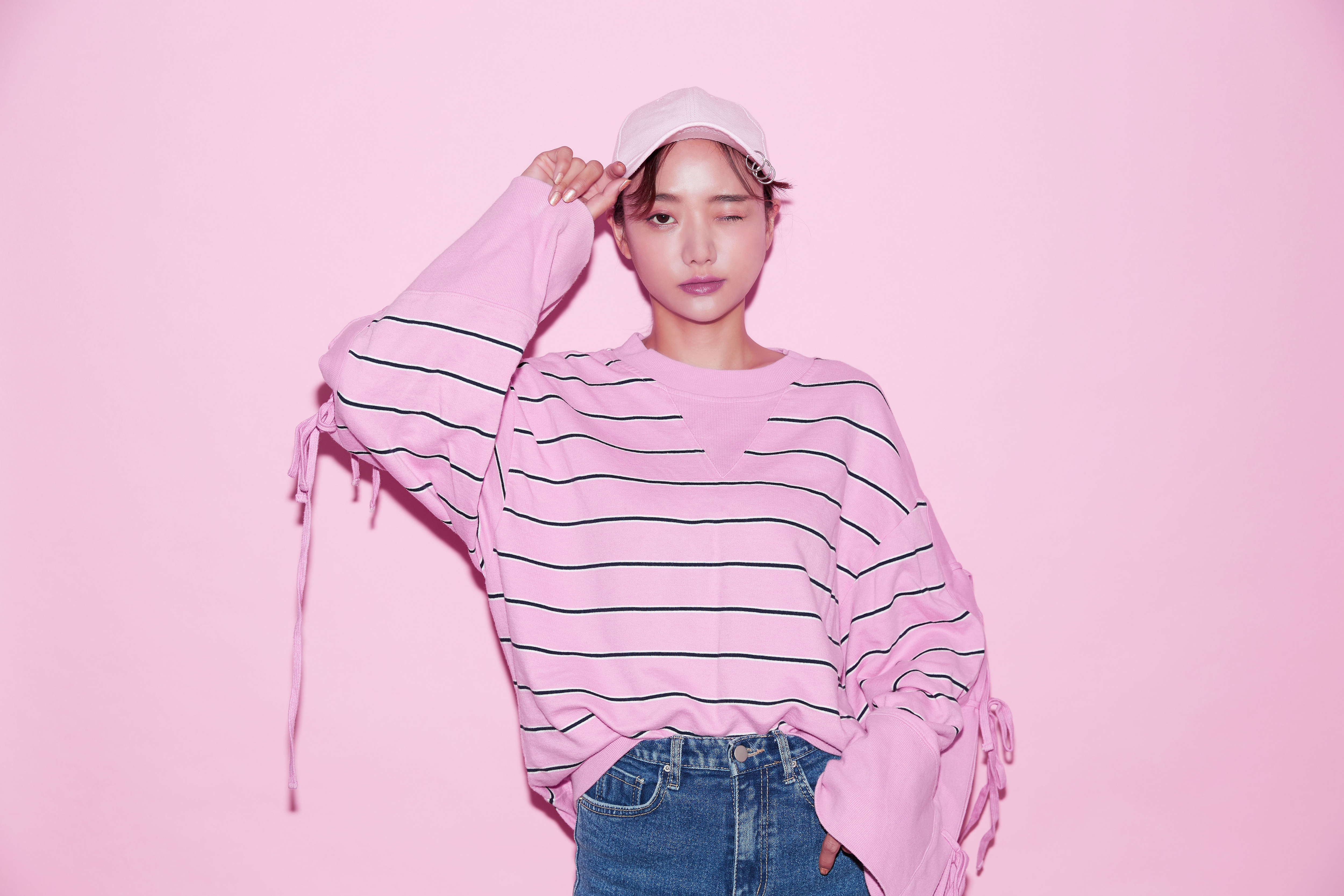korean woman wearing pink shirt