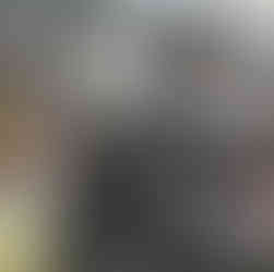 Observation of a commercial kitchen environment, examining cooking equipment, ingredients, and layou