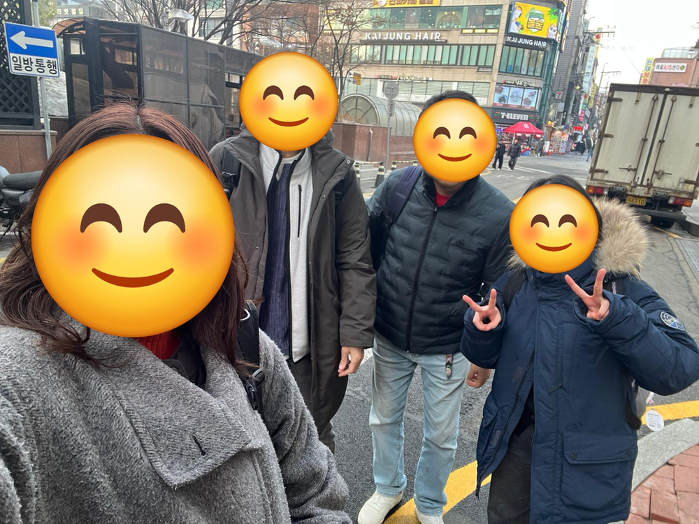 After completing field research, researchers gather on a city street to take a documentation photo, marking the conclusion of the study